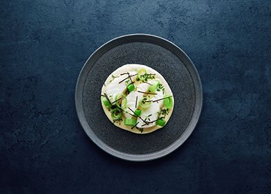 Baked skrei with potatoes, leek and truffle