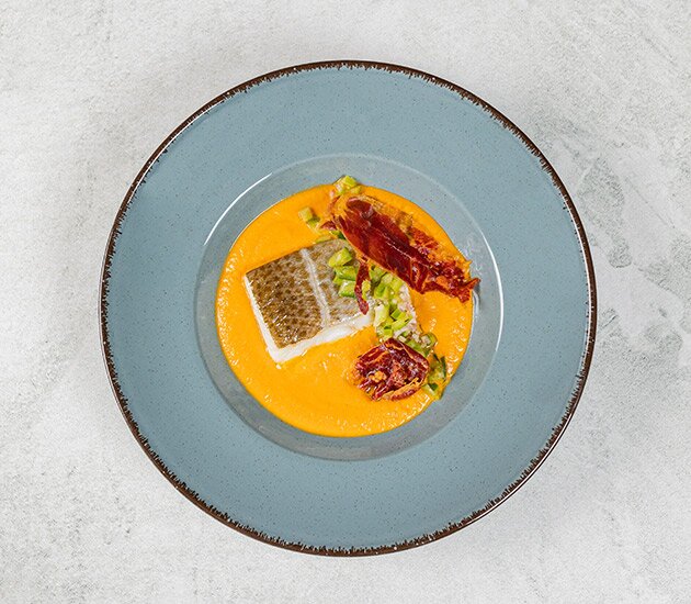 Norwegian skrei in a creamy pickled sauce