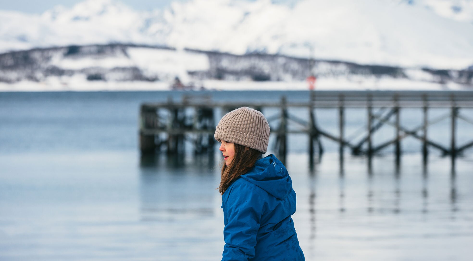 Young girl on looking out to sea